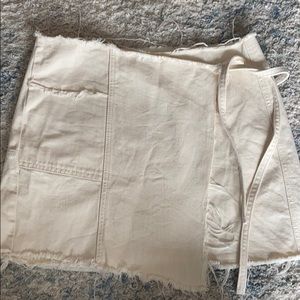 Tie around tan skirt